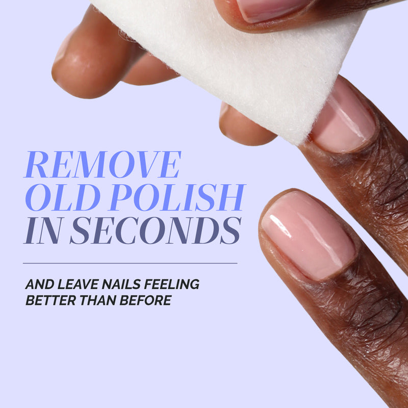 A hand uses a cotton pad to remove pink polish, highlighting the LONDONTOWN Jet Set Travel Nail Kit for fast, effective polish removal and healthier-feeling nails—an ideal choice for quick manicures on the go.