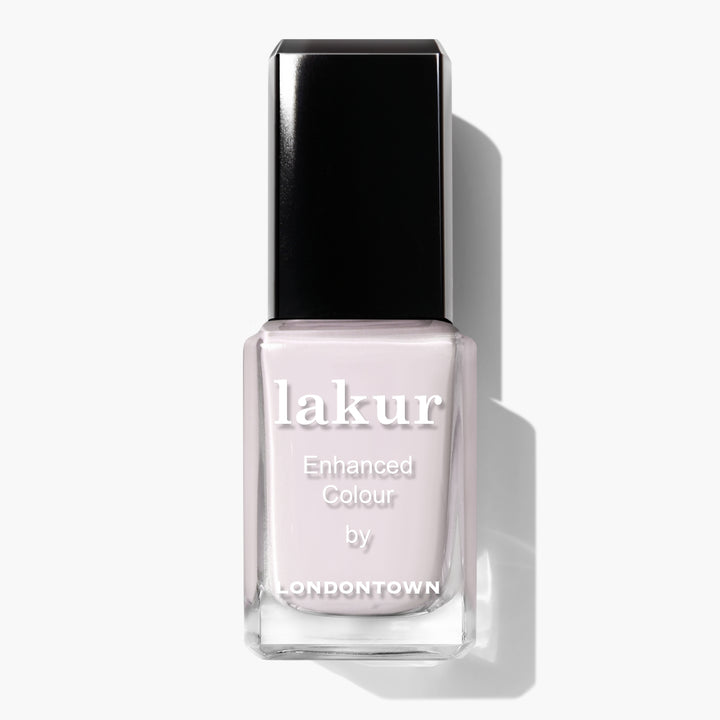 A bottle of Lakur Ski Bunny by LONDONTOWN. The rectangular bottle with a black cap houses a beautiful pink-tinted cream polish, perfect for any occasion.