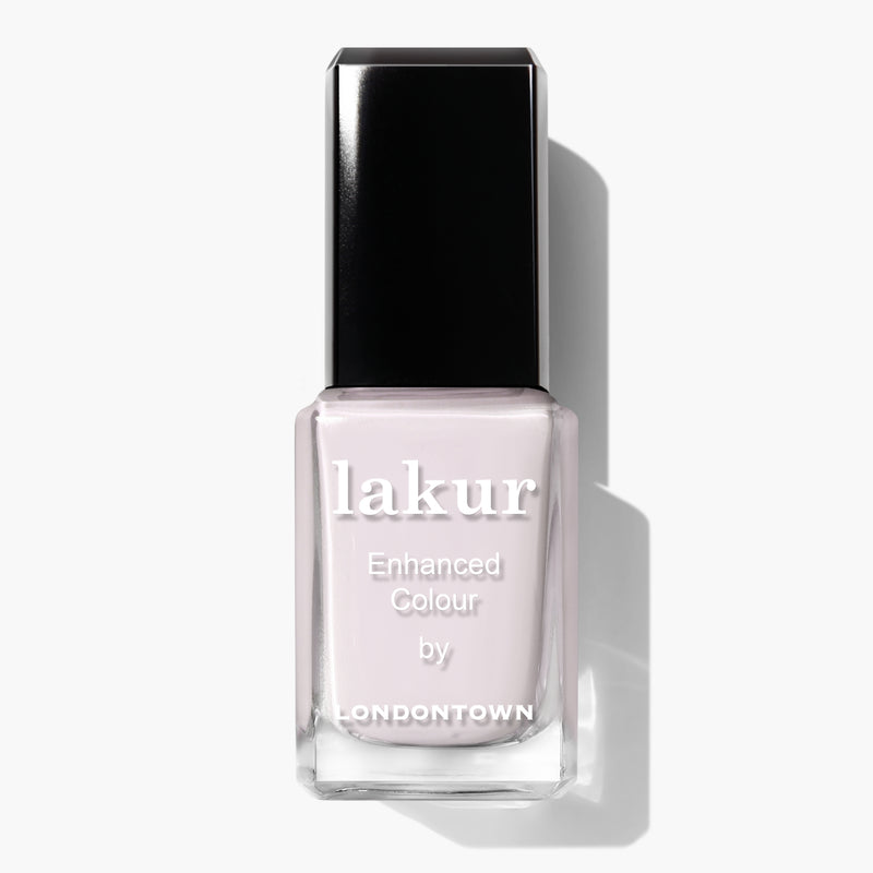 A bottle of Lakur Ski Bunny by LONDONTOWN. The rectangular bottle with a black cap houses a beautiful pink-tinted cream polish, perfect for any occasion.