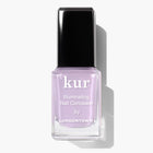 A bottle of LONDONTOWN Lavender Illuminating Nail Concealer, a light lavender polish with a perfecting formula, shown against a white background.