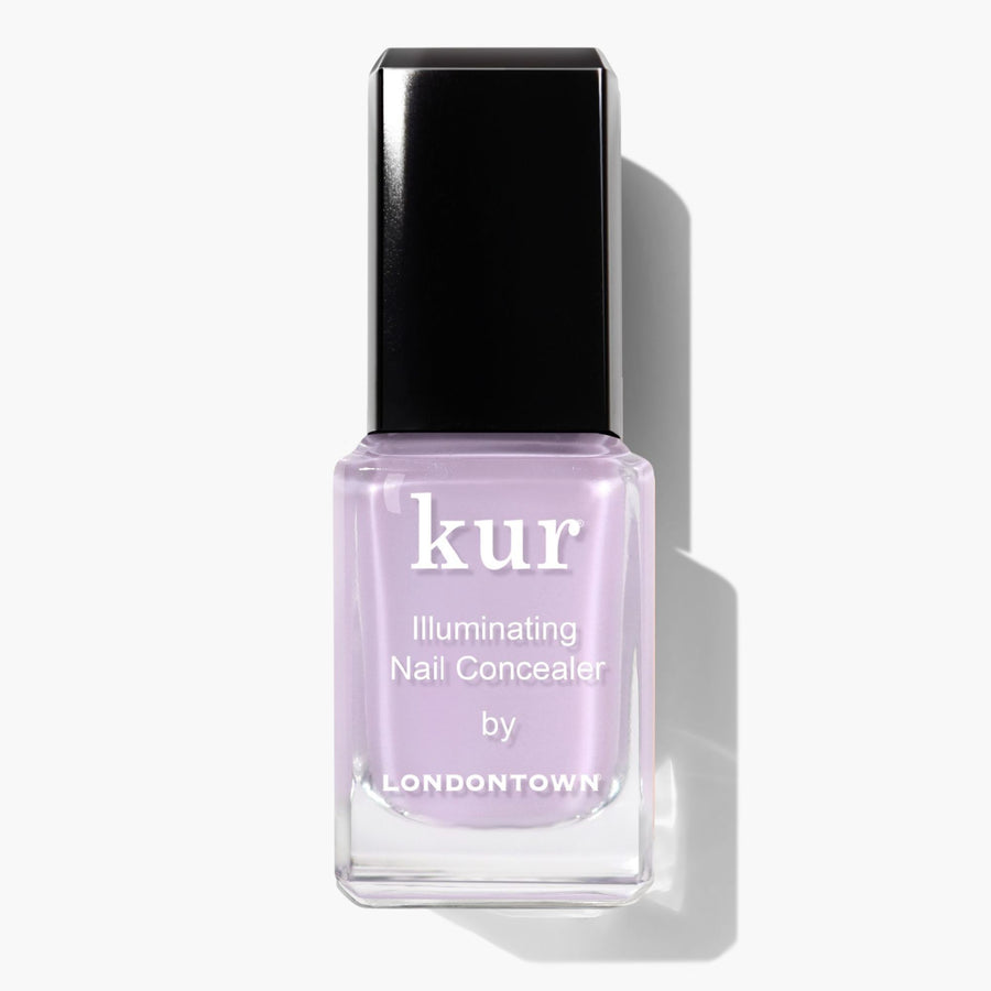 A bottle of LONDONTOWN Lavender Illuminating Nail Concealer, a light lavender polish with a perfecting formula, shown against a white background.