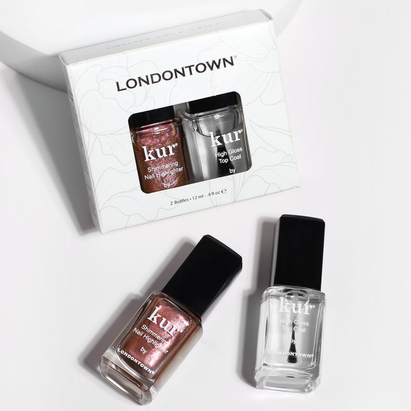 LONDONTOWN's The Runway Edit set includes two bottles: shimmering nail color and a high-gloss top coat, shown against a white background.