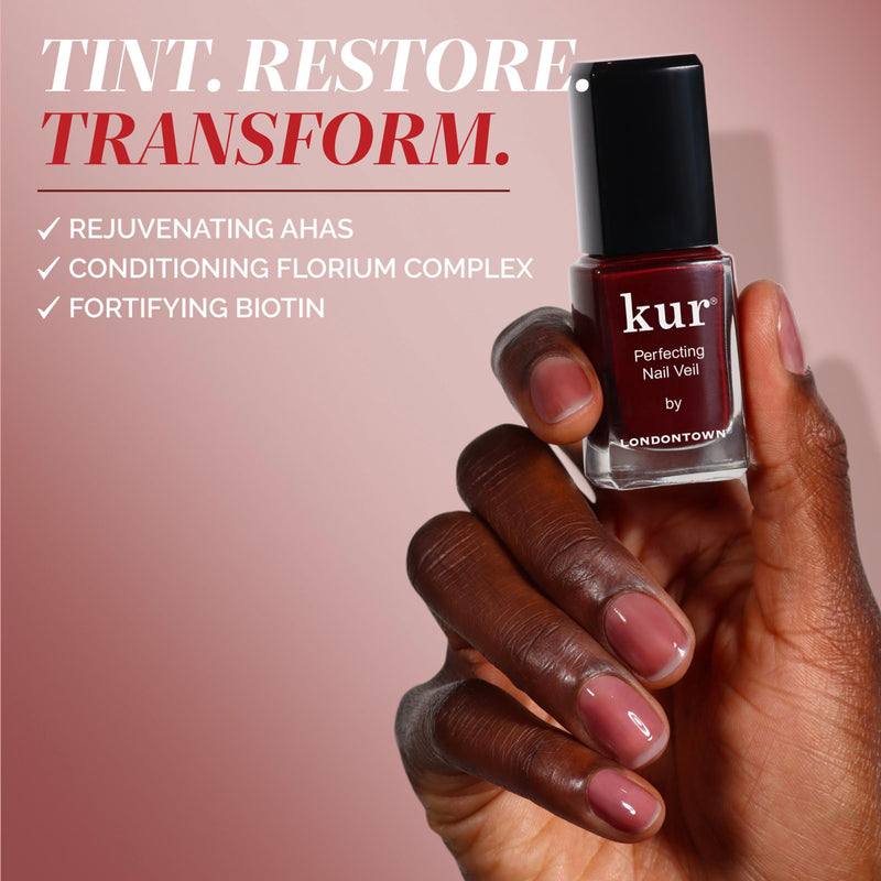 A hand with neatly manicured nails holds a bottle of LONDONTOWN Perfecting Nail Veil #10, which provides nourishing care and a touch of color. Text on a pink background features AHAs, Florium Complex, and Biotin benefits.