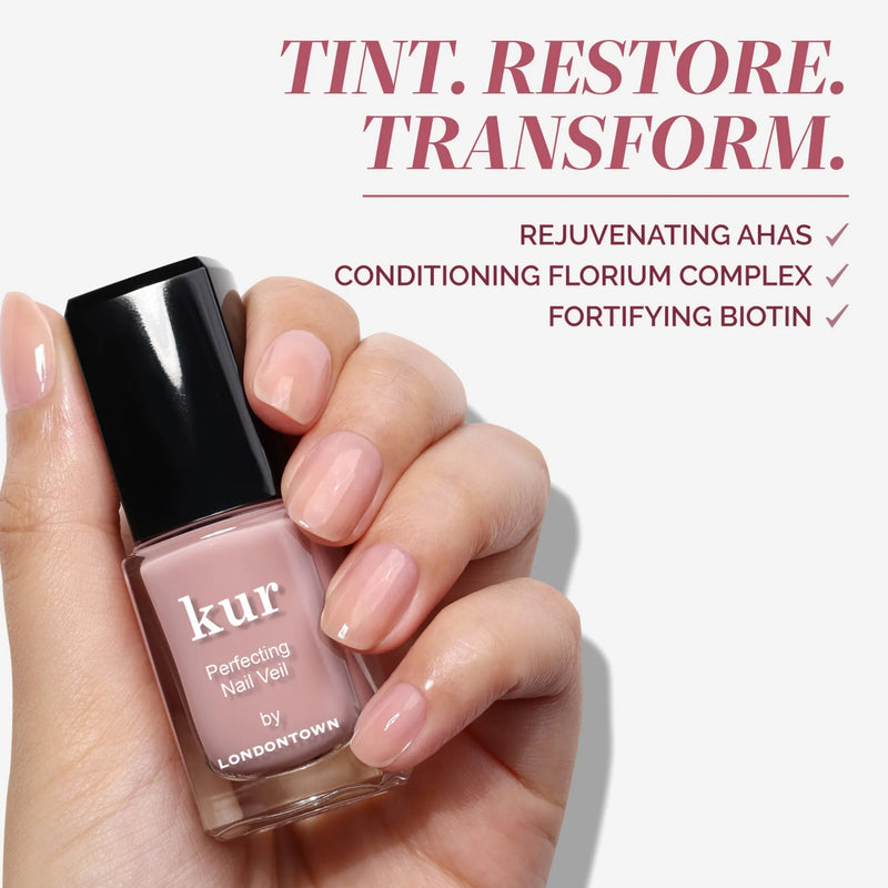 A manicured hand holds a bottle of LONDONTOWN Perfecting Nail Veil #4, showcasing nail care benefits with AHAs, florium complex, biotin, and a sheer wash of color.
