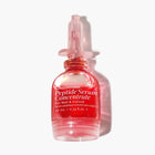 A 10 mL bottle of LONDONTOWN Peptide Serum Concentrate for nails and cuticles, featuring a clear dropper cap and red liquid inside—ideal for nourishing and repairing nails.