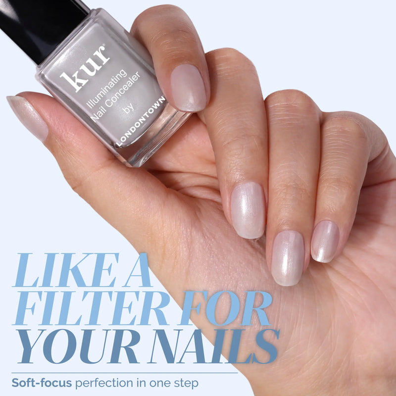 A hand with neatly manicured nails painted in Quartz Illuminating Nail Concealer holds a bottle of LONDONTOWN. Text reads: "Like an instant nail perfector—a filter for your nails.