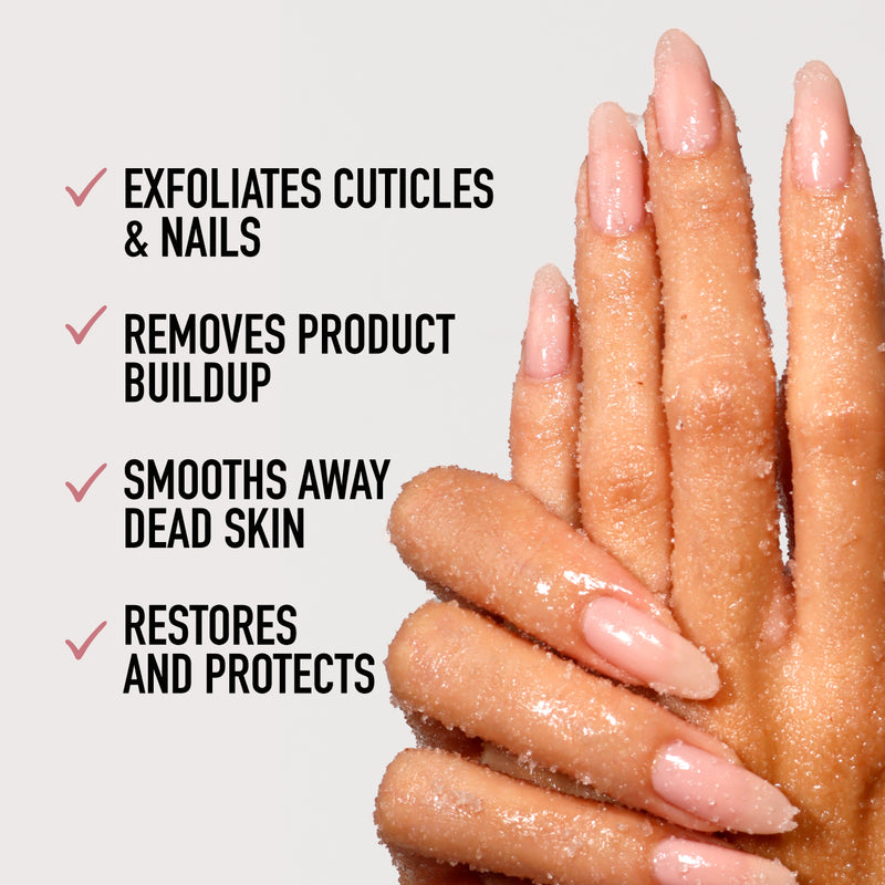 Hands treated with LONDONTOWN's Soft Touch Nail Scrub, highlighting manicured nails. It exfoliates cuticles, removes buildup, smooths skin, and restores protection.