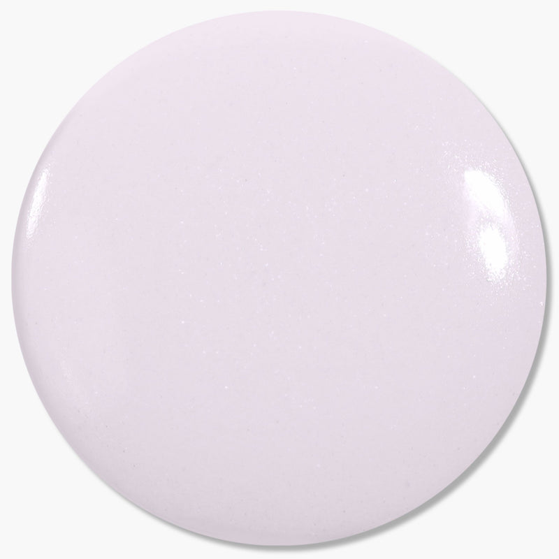 Strawberry Milk by LONDONTOWN features a round, glossy surface in milky lavender, with a smooth texture and subtle sparkle.