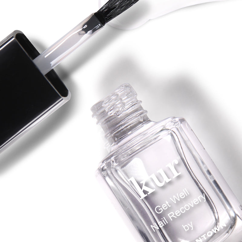 A LONDONTOWN "Get Well Nail Recovery" clear nail polish bottle with an open brush on a white background, designed to rehabilitate ultra weak nails.