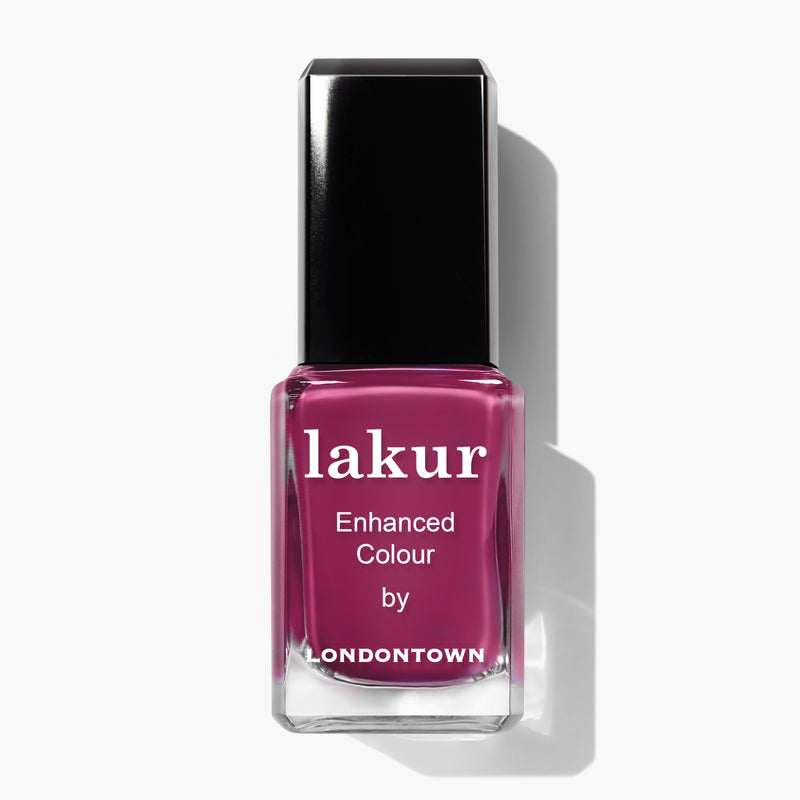 A bottle of LONDONTOWN's Lakur nail polish in a deep, fruity pink shade, labeled "Teeny 'Kini.