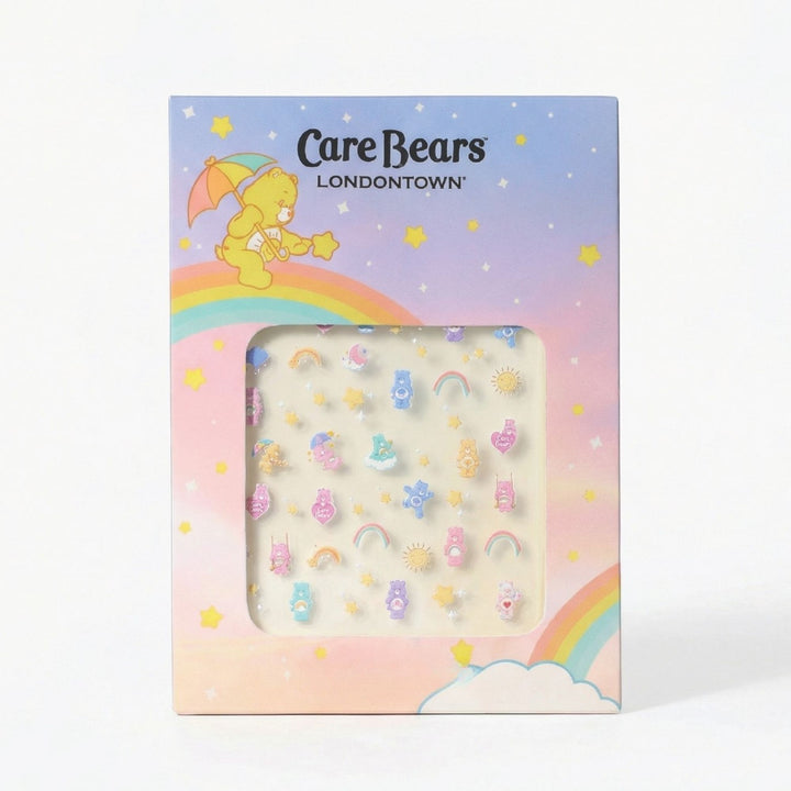 Care Bears Nail Decals by LONDONTOWN feature pastel Care Bears, rainbows, suns, and stars on a pastel rainbow and cloud background—making fun nail art easy for everyone.