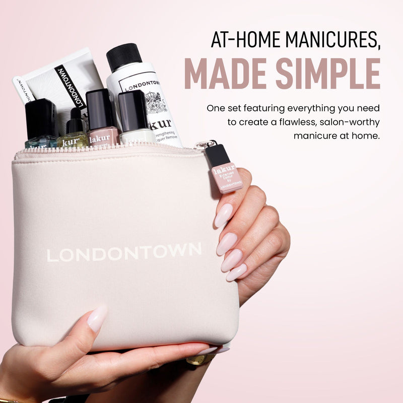 A hand holds a Londontown Discovery Set 2.0, showcasing nail care essentials, with the text "At-home manicures, made simple.