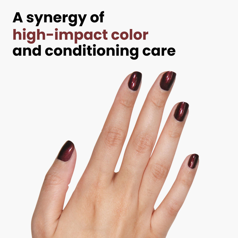 A hand with dark, glossy nail polish is shown against a white background. Text reads: "LONDONTOWN presents Cockney Glam: A synergy of high-impact color and conditioning care with our vegan cruelty-free formula.