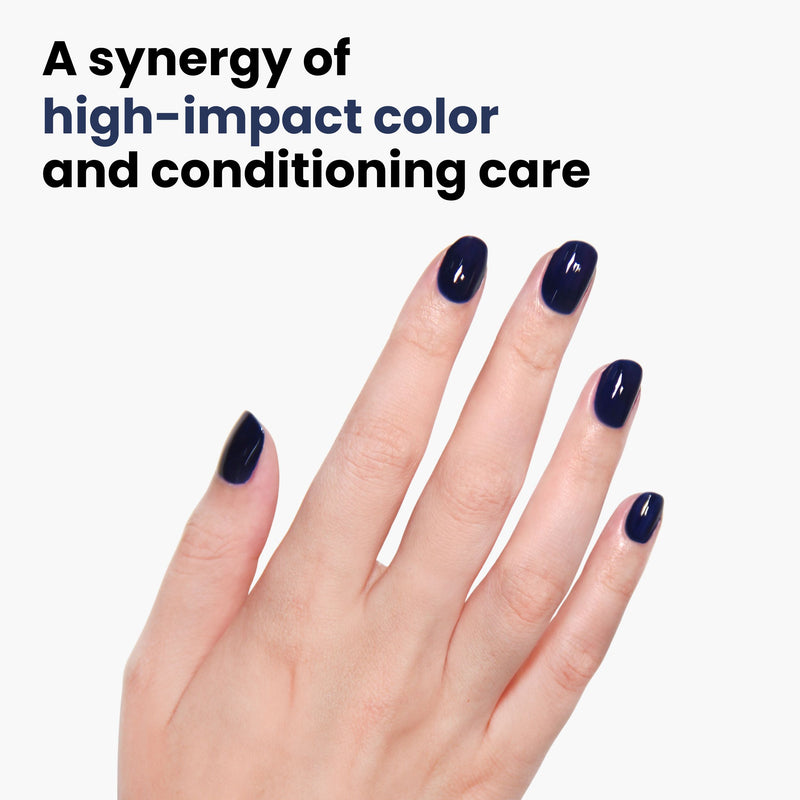 Against a white background, a hand with short, glossy navy blue nails displays the text "high-impact color and conditioning care," featuring LONDONTOWN's Vegan Cruelty-Free Florium Complex in Buckingham Blue.