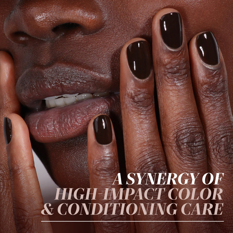 Close-up of a person with LONDONTOWN’s Midnight Mocha nail polish touching their face, paired with the text: "A Synergy of High-Impact Color & Conditioning Care.