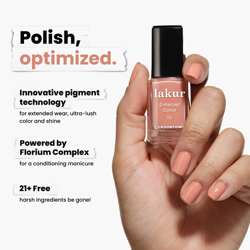 A hand holds Savanna by LONDONTOWN, a muted peach polish featuring an innovative pigment, Florium Complex, and 21+ Free formula for extended wear and shine with a sophisticated matte finish.