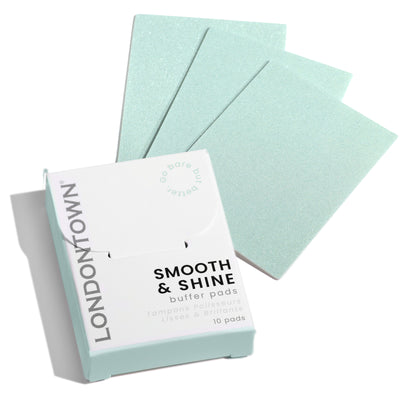 A box labeled "LONDONTOWN Smooth & Shine Buffer Pads" sits beside three mint green, polish-free pads designed to buff and add effortless shine.