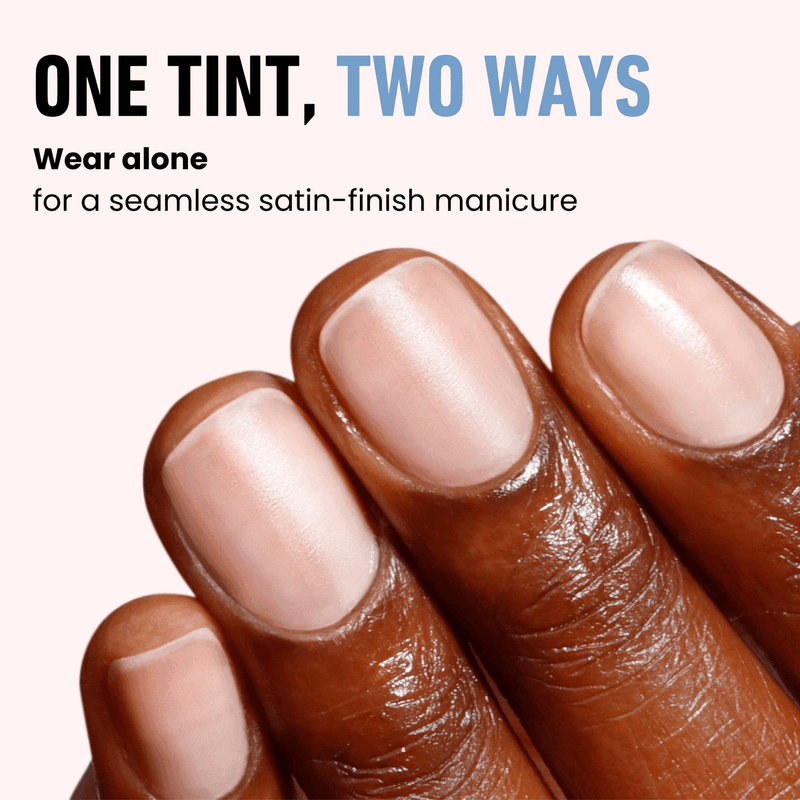 Close-up of a hand with LONDONTOWN's Tinted Fortifying Ridge Filler in Petal Pink. Text reads: "One Tint, Two Ways. Smooth ridges effortlessly, wear alone for a perfect satin-finish manicure.