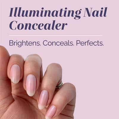 A manicured hand is shown against a pink background, highlighting LONDONTOWN’s One-Step Hero Minis—an illuminating nail concealer that brightens, conceals, and perfects.