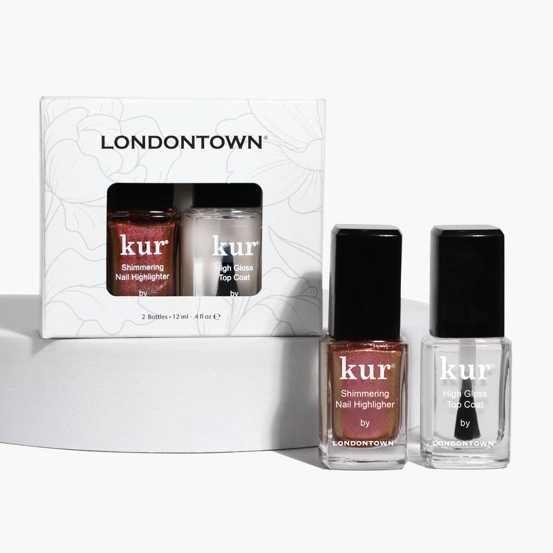 The Runway Edit by LONDONTOWN includes a set of two nail products: a shimmering nail highlighter and a high gloss top coat, all in branded packaging.