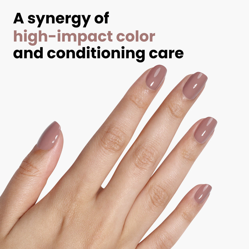 A hand with manicured nails painted in the shade "Chai" from LONDONTOWN against a white background. Text reads: "A synergy of high-impact color and conditioning care.