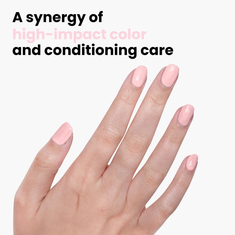 A hand with "Waterloo Sunset" rose petal pink polish from LONDONTOWN is shown against a plain background, featuring the text: "A synergy of high-impact color and conditioning care. Vegan and cruelty-free.