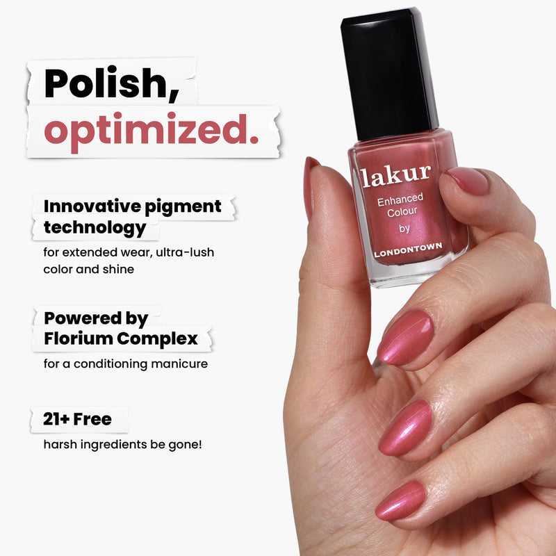 A hand holds a pink nail polish bottle labeled "Slopeside" by LONDONTOWN, featuring innovative pigment tech and Florium Complex. This rose-inspired shade is free of 21+ harsh ingredients, ideal for those seeking elegance without compromise.