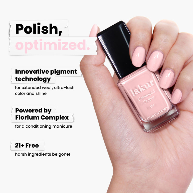 A hand holds a bottle of Waterloo Sunset nail polish by LONDONTOWN against a white background, highlighting its advanced pigment technology, the Florium Complex, and vegan, cruelty-free formula that is free from 21+ harsh ingredients.