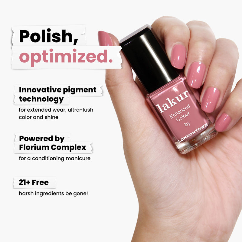 A hand holds a bottle of Mojave Mauve nail polish by LONDONTOWN. This cruelty-free, vegan formula offers innovative pigment for color and shine, features the Florium Complex, and is 21+ free of harsh ingredients.