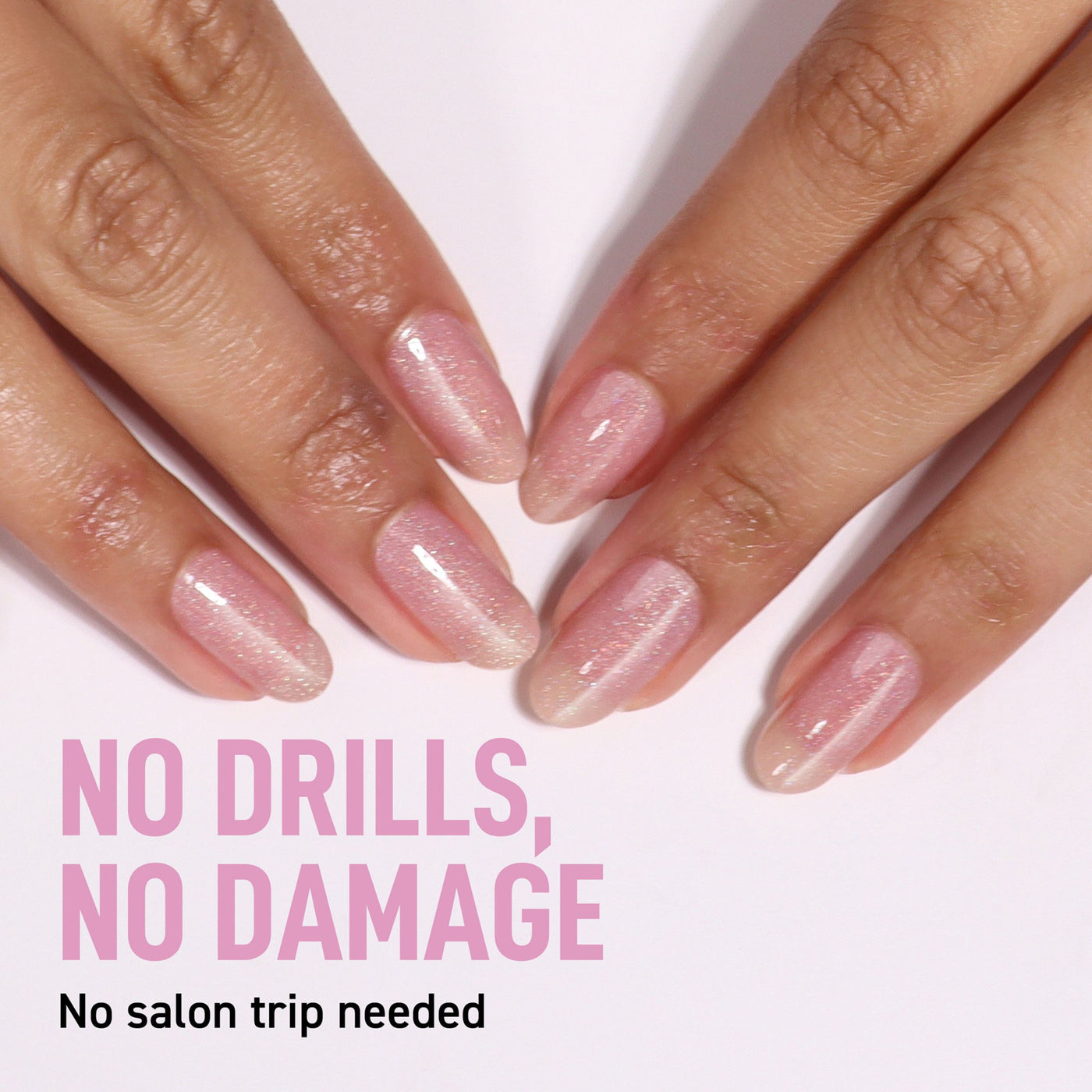 Close-up of hands with smooth, shiny pink nails. Text on image: "LONDONTOWN GelShift Top Coat—no drills, no damage. Skip the salon for flawless polish at home.