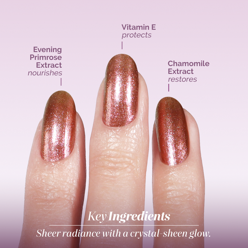 Three fingers with LONDONTOWN’s Shimmering Nail Highlighter - Molten, a rose-gold polish, are labeled with Evening Primrose Extract (nourishes), Vitamin E (protects), and Chamomile Extract (restores) for radiant nails.