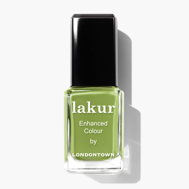 A bottle of LONDONTOWN Lakur nail polish in the Tipsy Mermaid shade with a black cap. The bottle reads "lakur Enhanced Colour by LONDONTOWN.
