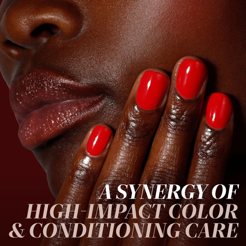 Close-up of a person with dark skin, Truly Ruby by LONDONTOWN on their fingernails, touching their face, with text reading “A SYNERGY OF HIGH-IMPACT COLOR & CONDITIONING CARE.”.