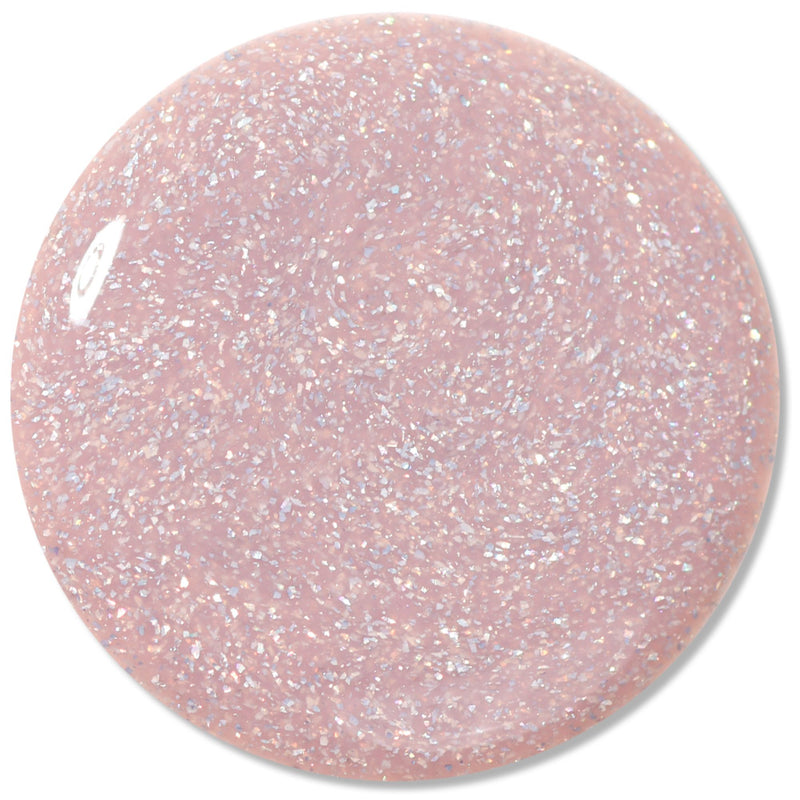 The LONDONTOWN "Champagne in Bed" nail polish is a holographic pink shade infused with fine silver glitter.