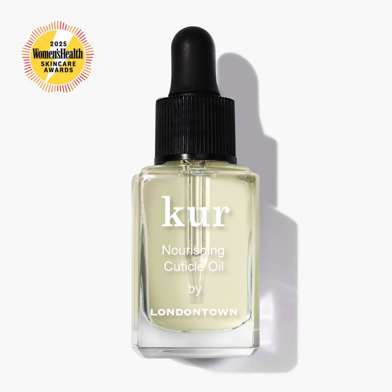 A bottle of LONDONTOWN Nourishing Cuticle Oil with a dropper cap for cuticle care. The Women’s Health Skincare Awards 2024 badge is displayed in the top left corner.