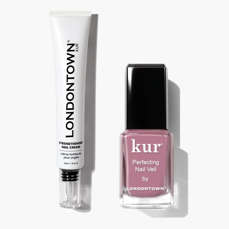The LONDONTOWN Sheer Nail Strengthening Set, featuring a nail cream and a pink kur Perfecting Nail Veil polish, is pictured side by side on a white background—a perfect duo to nourish your nails and deliver beautiful, repeat-worthy results.