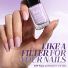 A hand with manicured nails holds a bottle of LONDONTOWN Lavender Illuminating Nail Concealer; text reads: "LIKE A FILTER FOR YOUR NAILS. This perfecting formula delivers soft-focus perfection in one step.