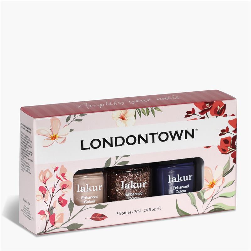The Moonlit Botanica Mini lakur trio by LONDONTOWN is a boxed set of three nail polishes in assorted colors, featuring floral-themed packaging.