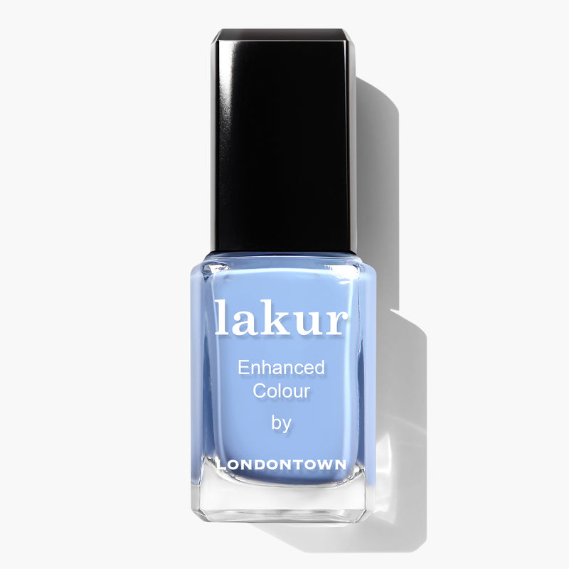 A bottle of LONDONTOWN's Amalfi Love nail polish in a cool blue tone with a black cap, 16+ Free and vegan cruelty-free.