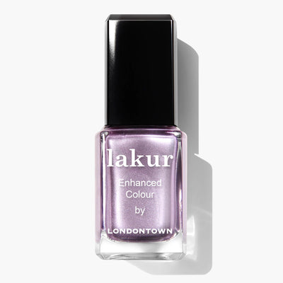 A bottle of LONDONTOWN BRILL-ant (Professional) cruelty-free nail polish in a light lavender shade with a black cap.