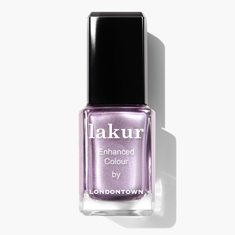 A bottle of BRILL-ant nail polish by LONDONTOWN, featuring a light purple shade with a glossy finish and a black cap. This 16+ free, vegan, and cruelty-free nail polish ensures top-quality and ethical beauty.