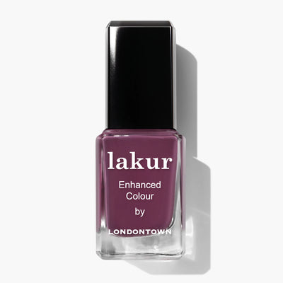 A bottle of Best Year Ever (Professional) nail polish by LONDONTOWN, displaying a dark berry shade, with a black cap and white text on the label.