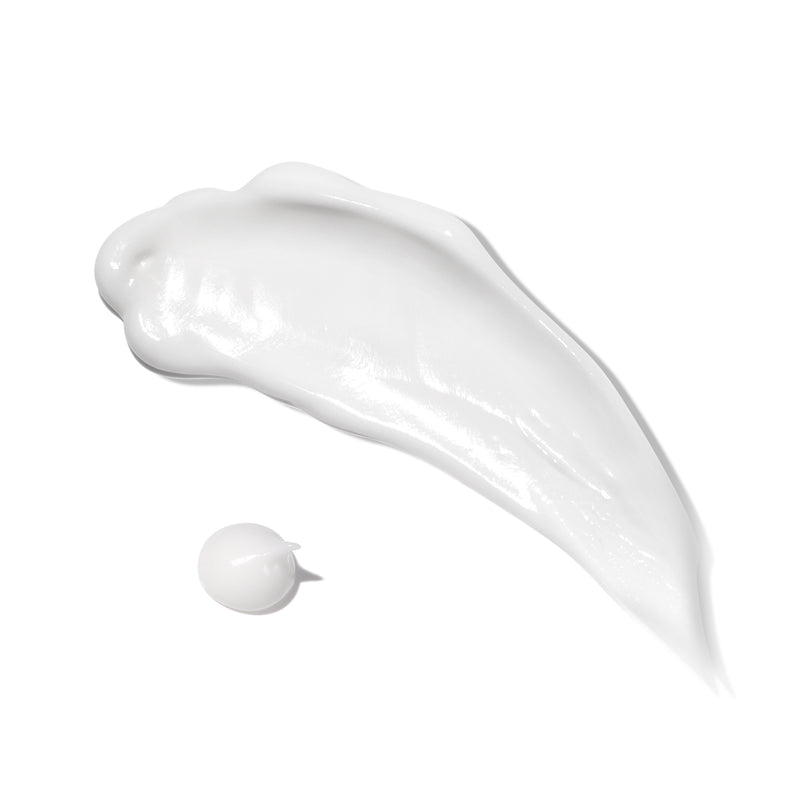 A smear and a dot of Nourishing Body Conditioner by LONDONTOWN against a plain white background, promising smoother skin.