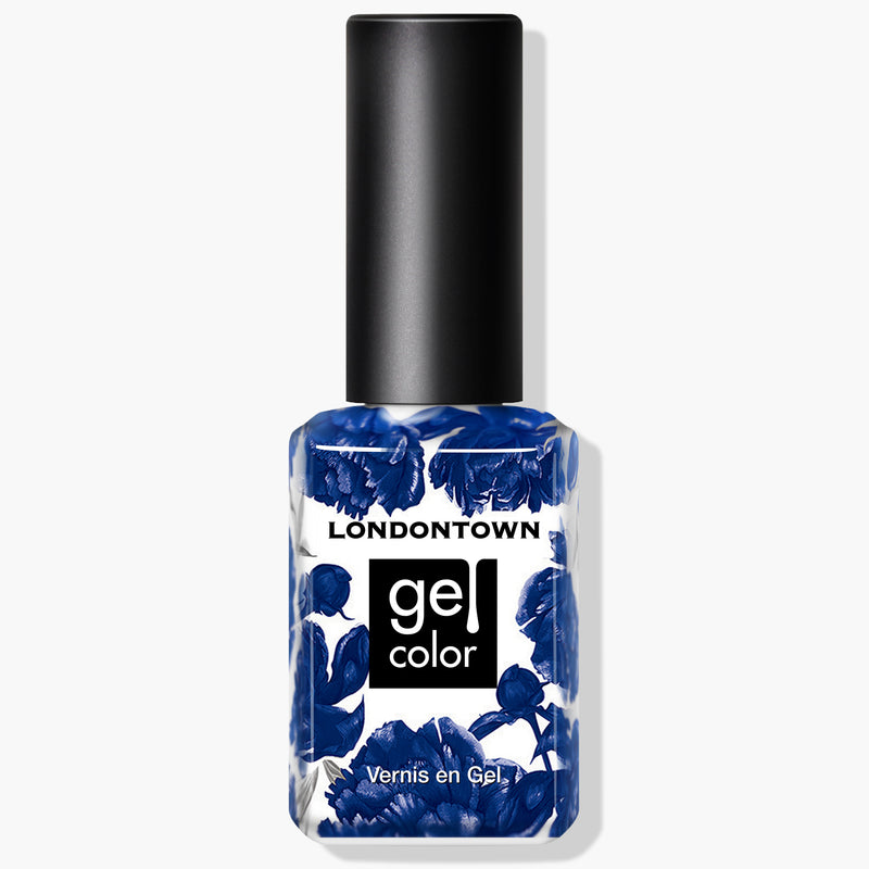 LONDONTOWN's Buckingham Blue Gel Color nail polish in a captivating Navy Blue shade, adorned with a blue floral design and a black cap labeled "Vernis en Gel." This vegan, cruelty-free polish delivers salon-quality results when paired with a UV LED light.