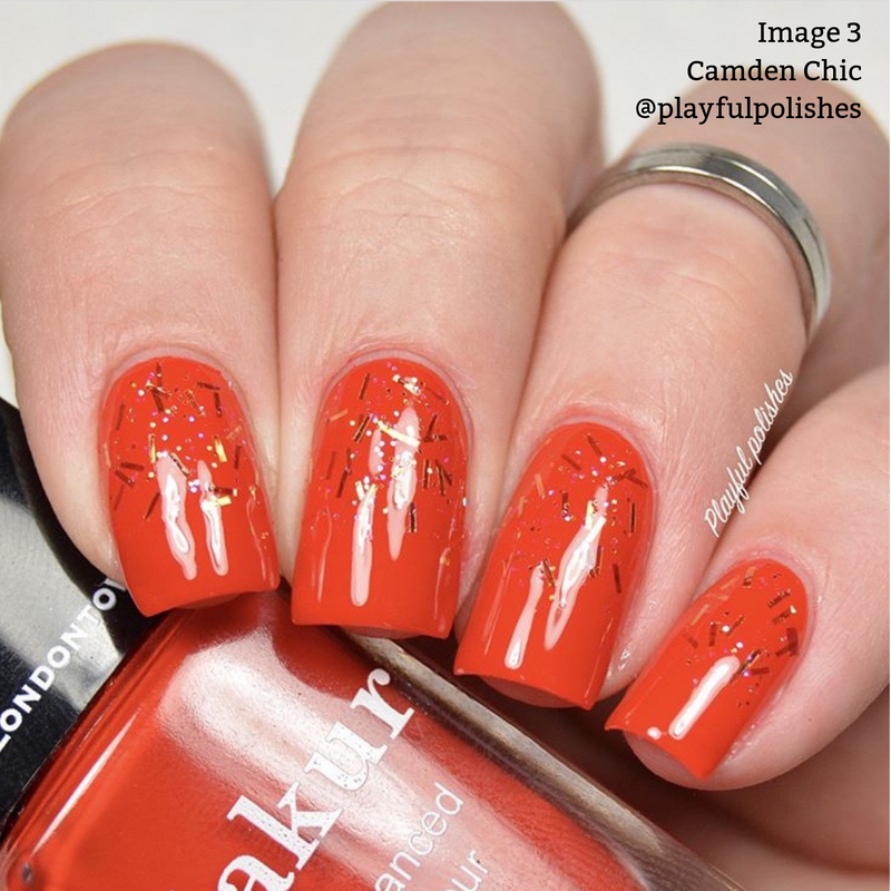 A hand with red, glittery nail polish holds a matching red nail polish bottle. Text on the image reads "Image 3 Camden Chic @playfulpolishes," featuring LONDONTOWN's vegan cruelty-free formula.