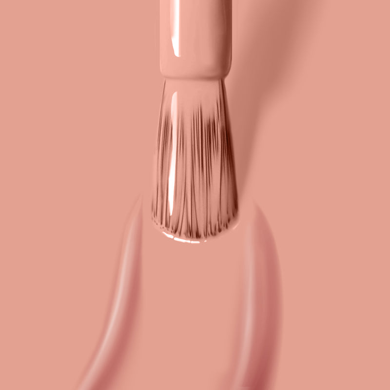 A close-up of a LONDONTOWN manicure brush applying the Chiffon light pink gel polish, perfect for a stunning manicure that can be cured under UV/LED light.