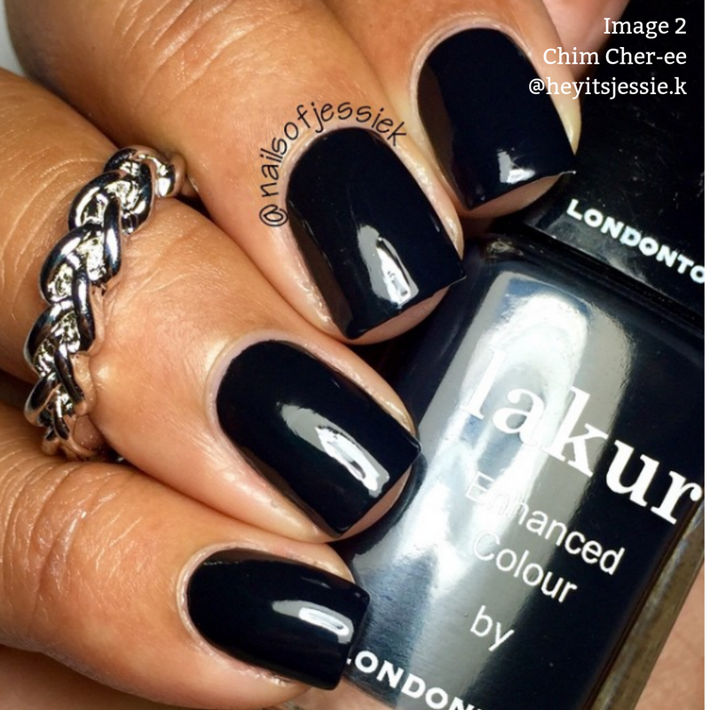Close-up of a hand with jet black crème polished nails holding a bottle of LONDONTOWN Chim Cher-ee vegan cruelty-free black nail polish. The hand features a silver chain ring on the index finger. Tags: @nailsofjessiek, Image 2 Chim Cher-ee, @heyitsjessie.k.
