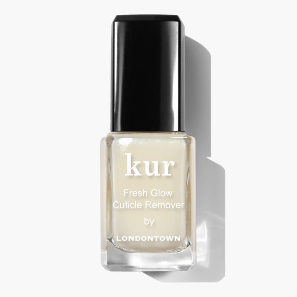 A bottle of LONDONTOWN Fresh Glow Cuticle Remover, an effective solution for dry and overgrown cuticles, featuring a black cap and a white label on a white background.
