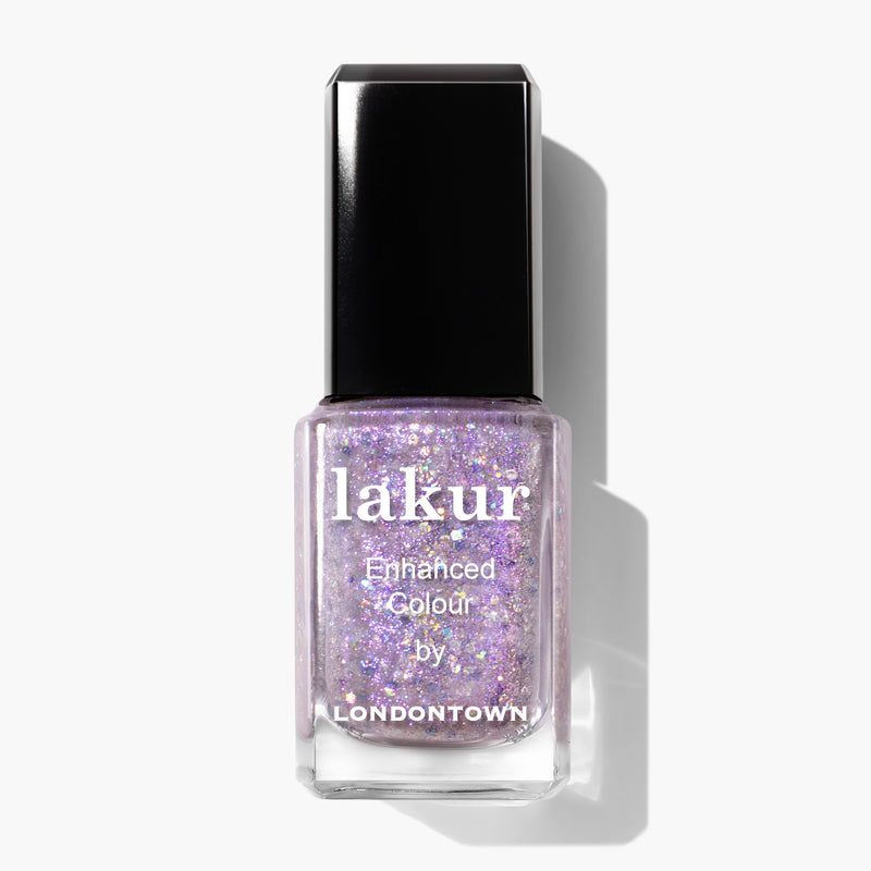 A bottle of LONDONTOWN Grape Fizz Lakur Enhanced Colour nail polish in a holographic purple glitter shade.