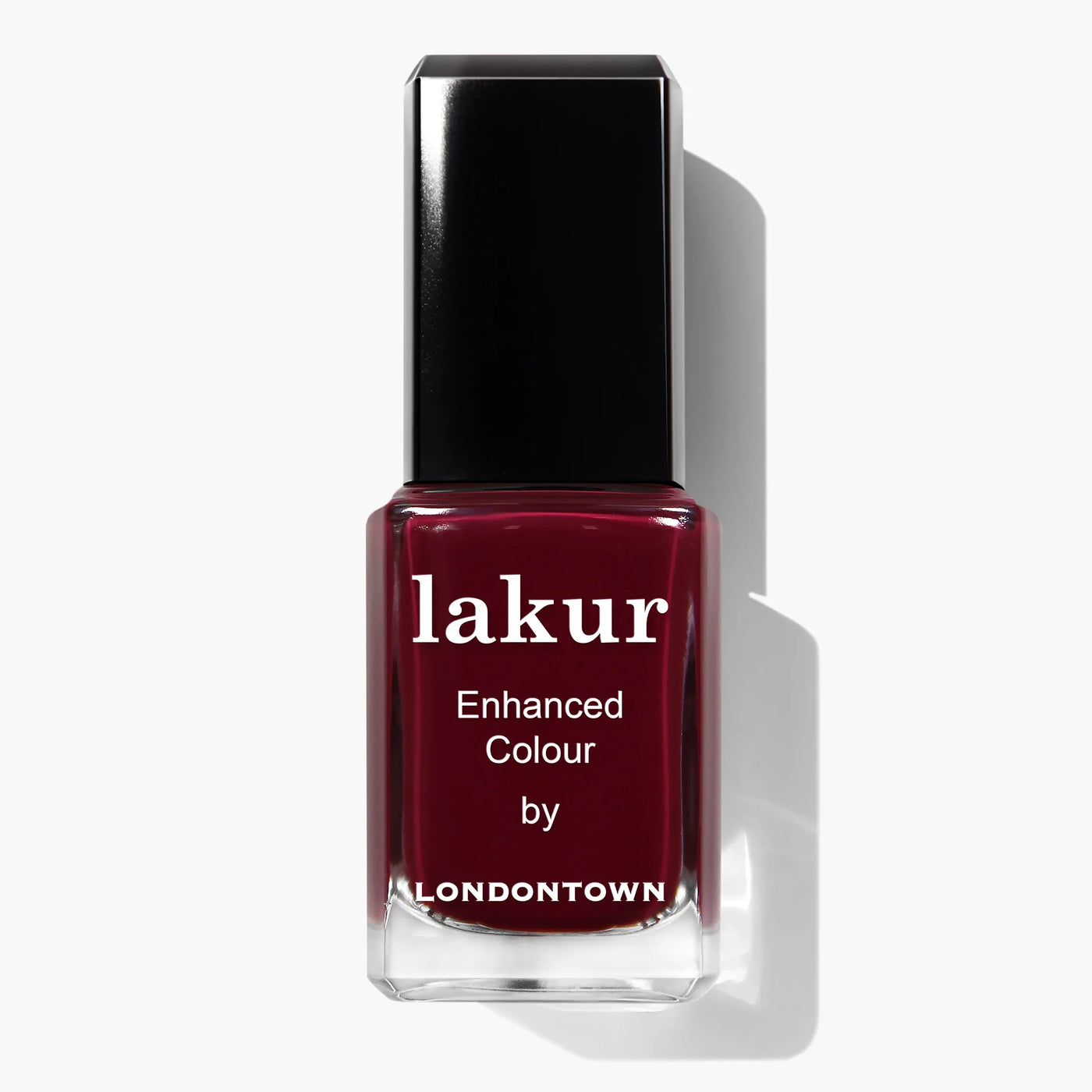 A bottle of Guarded Jewel (Professional) nail polish by LONDONTOWN in a deep maroon crème shade, labeled "Enhanced Colour." This vegan and cruelty-free nail polish offers a rich, sophisticated look.